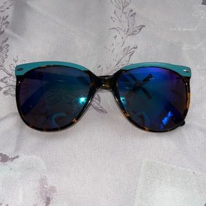 blue lensed sunglasses with blue rim